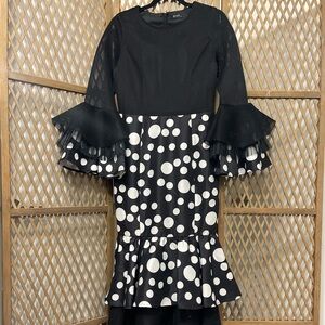 Long polka dot formal dress with mixed materials. Size small.